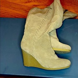 Tall wedge heeled boots